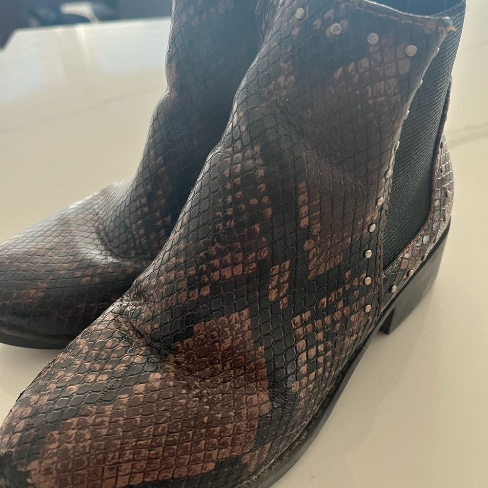 Kids size 1 snake skin booties. Good condition. A little frayed around ankle